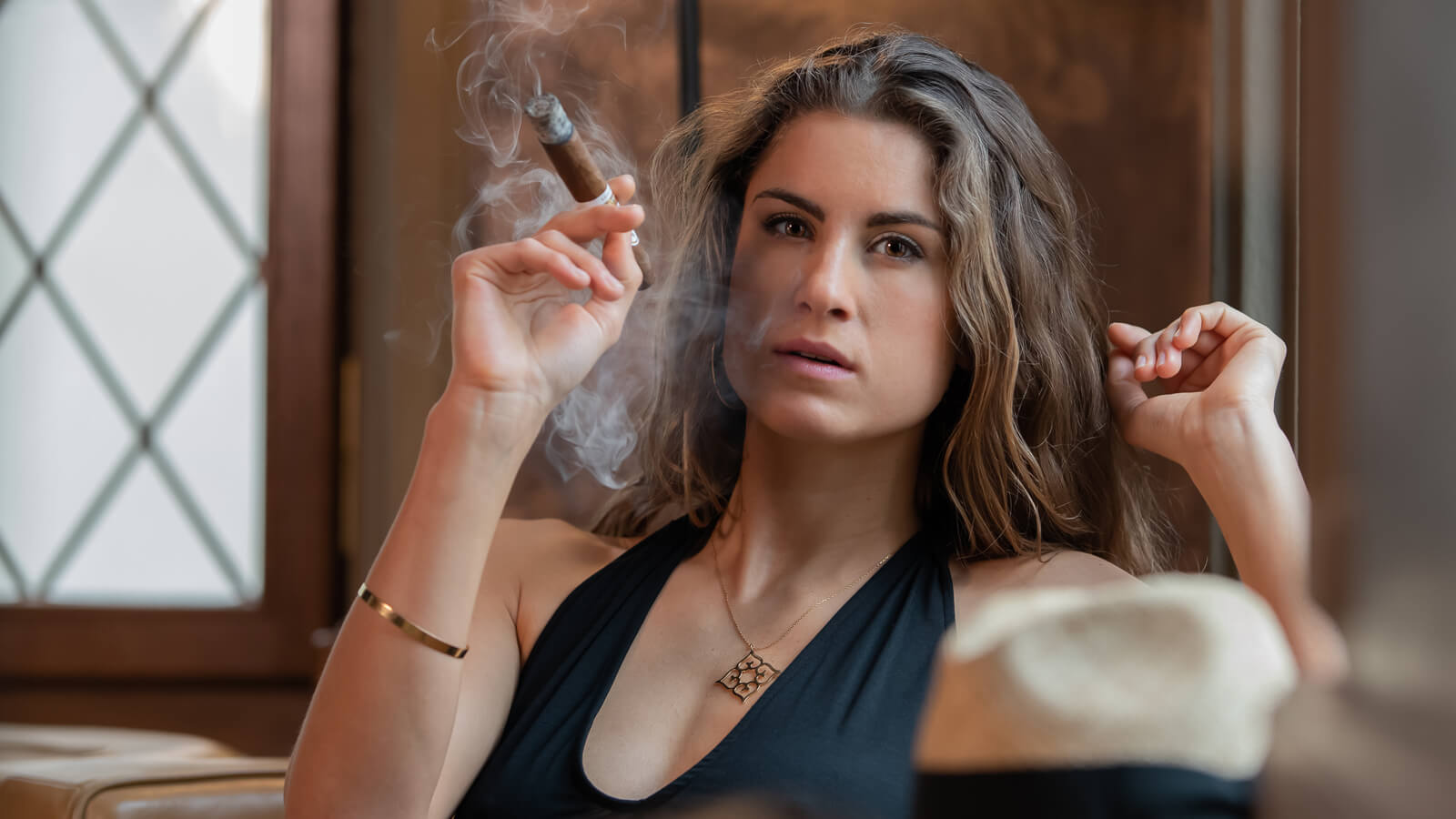 6 Reasons Why We Love Women & Cigars | A Gentleman's World